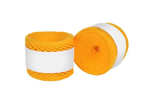Two skeins of orange color elastic knitted cotton yarn for crochet. Roll with mockup label layout on white background. Use for handwork, creating wicker baskets and home accessories.