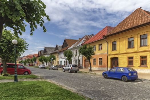 Historical street in Kezmarok city by day, Slovakia