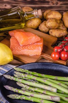 Set of fresh products for healthy food on wooden table on a rustic wooden background. selective focus