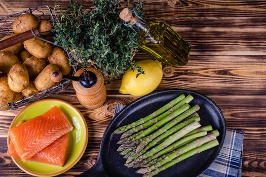 Set of fresh products for healthy food on wooden table on a rustic wooden background. selective focus