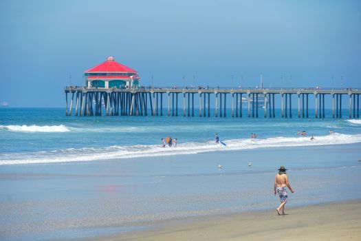 Aerial view of Huntington Beach and coastline during hot blue sunny summer day, Southeast of Los Angeles. California. destination for holiday and surfer