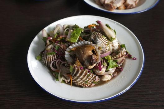 Thai street food , Spicy blood cockle salad