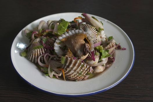Thai street food , Spicy blood cockle salad