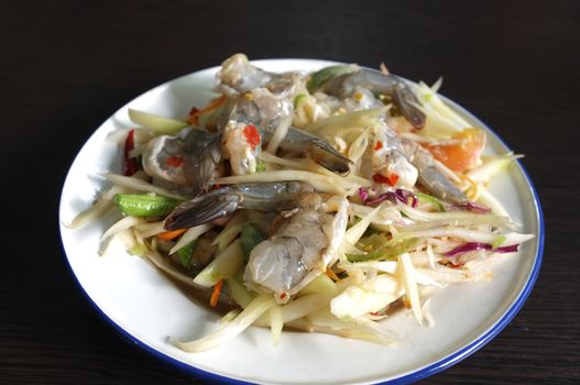 Thai green papaya salad with raw shrimps or Som Tam Thai Gung