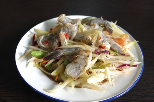 Thai green papaya salad with raw shrimps or Som Tam Thai Gung