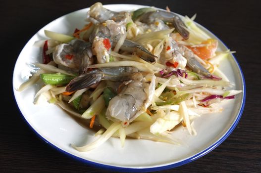 Thai green papaya salad with raw shrimps or Som Tam Thai Gung