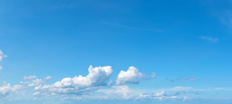 Soft white clouds against blue sky ,Panoramic fluffy clouds in the blue sky