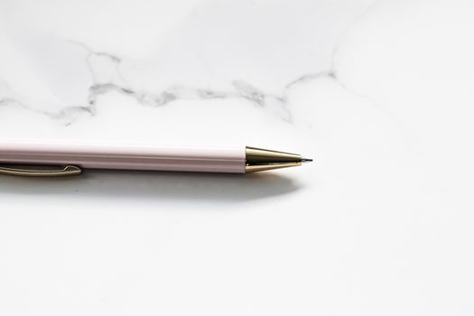 White pen on marble background, luxury stationery and business branding