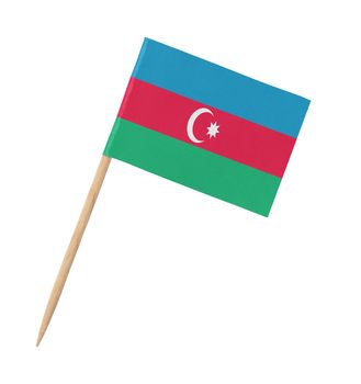 Small paper flag of Azerbaijan on wooden stick, isolated on white