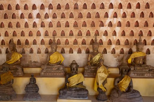 Temples at Luang Prabang Laos with Buddha statues and detailed golden shrines. High quality photo