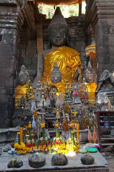 Temples at Luang Prabang Laos with Buddha statues and detailed golden shrines. High quality photo