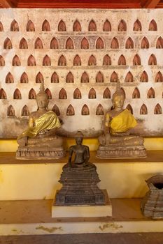 Temples at Luang Prabang Laos with Buddha statues and detailed golden shrines. High quality photo