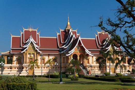 Temples at Luang Prabang Laos with Buddha statues and detailed golden shrines. High quality photo