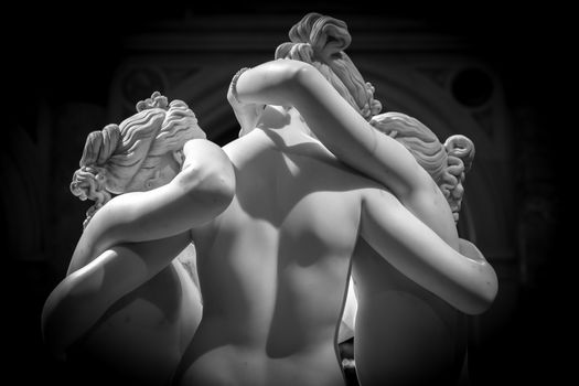 MILAN, ITALY - CIRCA JUNE 2020: Antonio Canova’s statue The Three Graces (Le tre Grazie). Neoclassical sculpture, in marble, of the mythological three charites (made in Rome, 1814-1817)