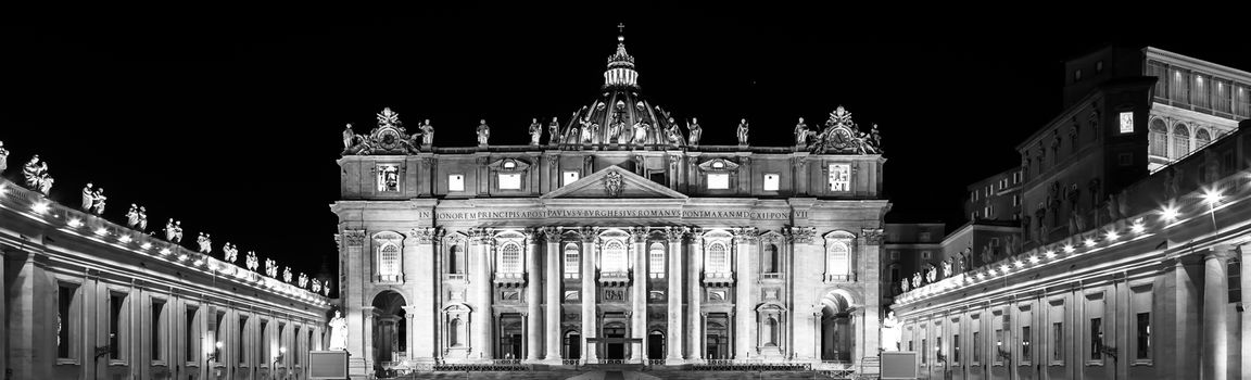 Papal Basilica of Saint Peter in  Vatican City illuminated by night, designed by Michelangelo and Bernini