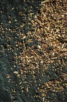 Provencal spices mix closeup on luxury stone background as flat lay, dry food spices and recipe ingredients