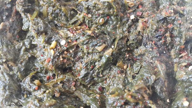 Close up view of delicious traditional fresh spinach leaves or vegetables cooked dish, delicious food also called paalak saag, food background for text