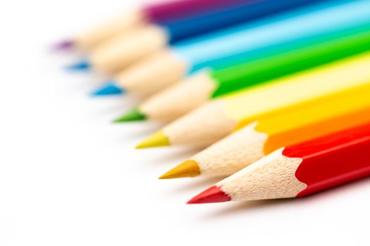 A Colorful color wooden pencils on a white background