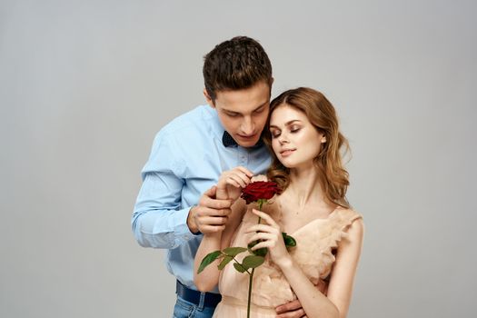 man giving woman roses relationship charm lifestyle embrace lifestyle. High quality photo