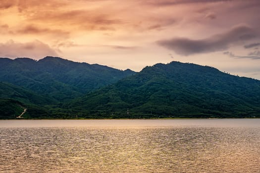 View of landscape nature and river with mountain and color of sunlight in twilight