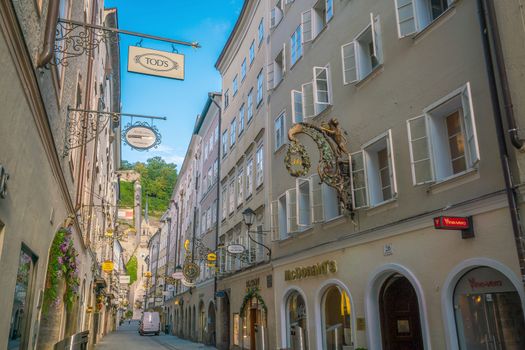 Salzburg, Austria - August 13, 2018:  Getreidegasse street - famous shopping street in Salzburg old town.