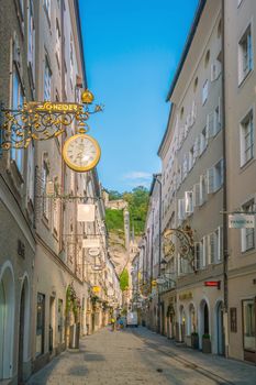 Salzburg, Austria - August 13, 2018:  Getreidegasse street - famous shopping street in Salzburg old town.