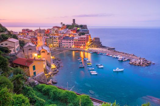 View of Vernazza at sunset. One of five famous colorful villages of Cinque Terre National Park in Italy