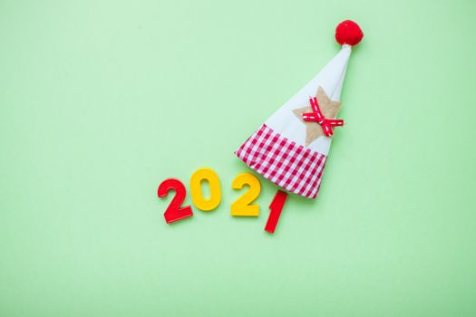 Happy New year 2021 celebration. The inscription 2021 on the green background