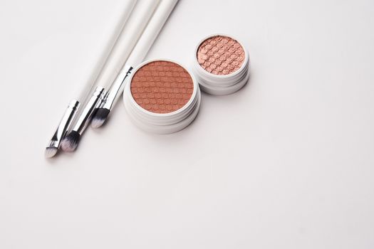 professional eyeshadow on isolated background and makeup brushes cosmetics fashion. High quality photo