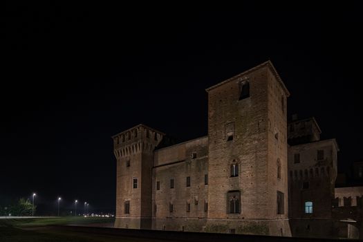 The Castle of San Giorgio di Mantova seen at night, a night landscape of a historic Italian city