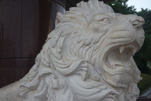 White lion statue background with copy space for text