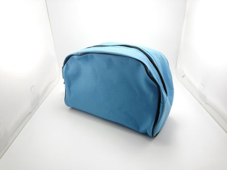 Blue portable hand bag with sling use to put stuffs inside