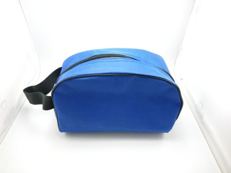 Blue portable hand bag with sling use to put stuffs inside