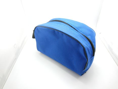 Blue portable hand bag with sling use to put stuffs inside