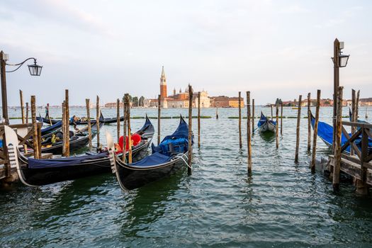 Gondolas at the Piazza San Marco in Venice, Italy, with San Giorgio Maggiore in the back