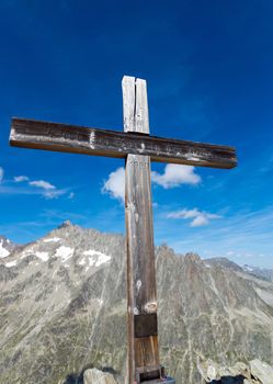 A summit cross in the Valais in the swiss alps