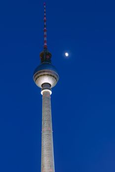 The Berlin landmark television tower at Alexanderplatz at night