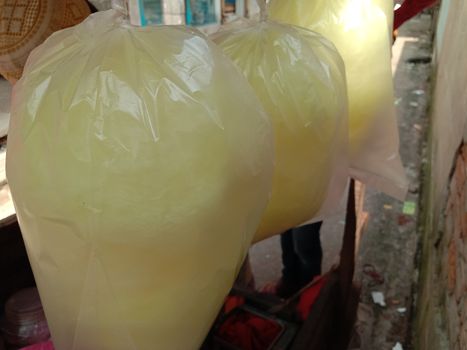 tasty and healthy yellow colored cotton candy