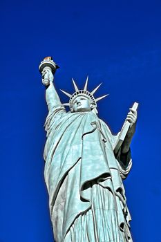 The Statue of Liberty is a colossal copper statue designed by Auguste Bartholdi a French sculptor was built by Gustave Eiffel.Dedicated on Oct 28, 1886.One of most famous icons of the 4th of July USA.