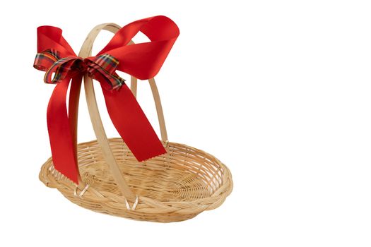 Empty gift basket with red ribbon bow for Christmas