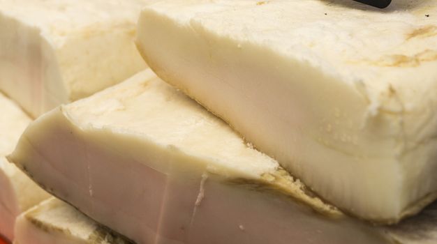 Fresh white salted lard for sale at the farmers market