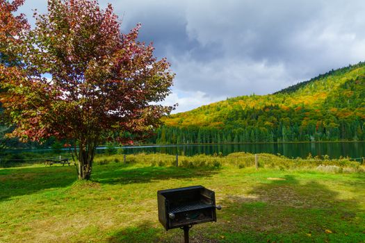 View of Lauzon lake and fall foliage colors, in Mont Tremblant National Park, Quebec, Canada