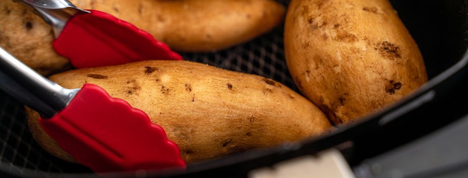 Roasted sweet potato cooked by airfryer at home. Healthy food for diet eating.