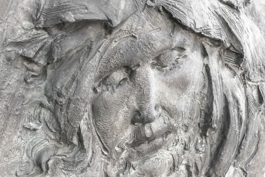 Face of Jesus Christ (fragment of statue). Antique stone statue of Jesus Christ.