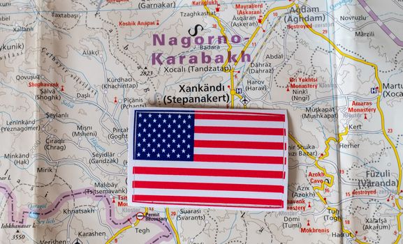 US flag on the background of the map of Nagorno-Karabakh