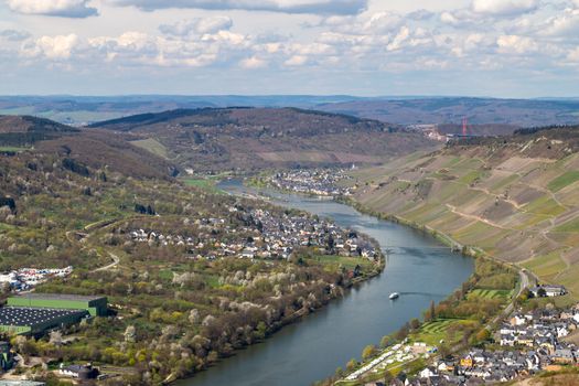 Panoramic view on the valley of the river Moselle and the city Bernkastel-Kuesn and the wine village Graach