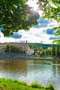 Prague architecture. Embankment in a green park