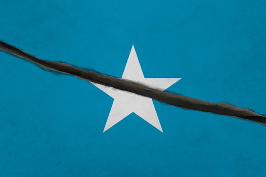 Somalia flag cracked. Patriotic background. National flag of Somalia