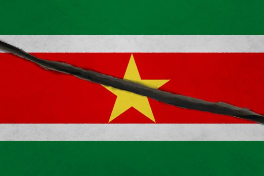 Suriname flag cracked. Patriotic background. National flag of Suriname