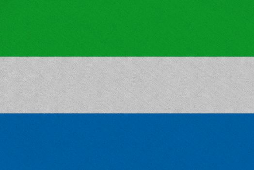 Sierra leone fabric flag. Patriotic background. National flag of Sierra leone